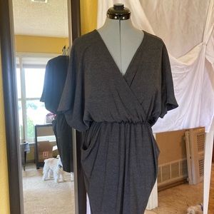 Gray mini dress that gathers at the waist.